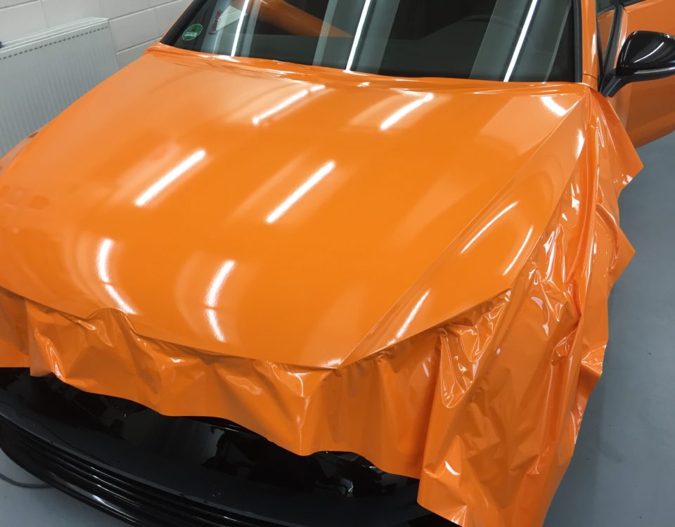 Volkswagen Golf oranje wrap